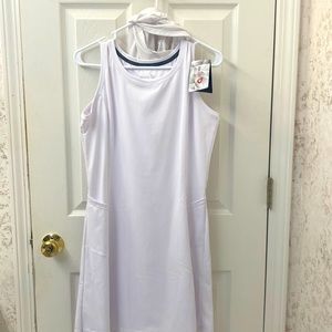 Dress has 2 sides pockets. 2 inner short pockets.Inner with 4" inner shorts.